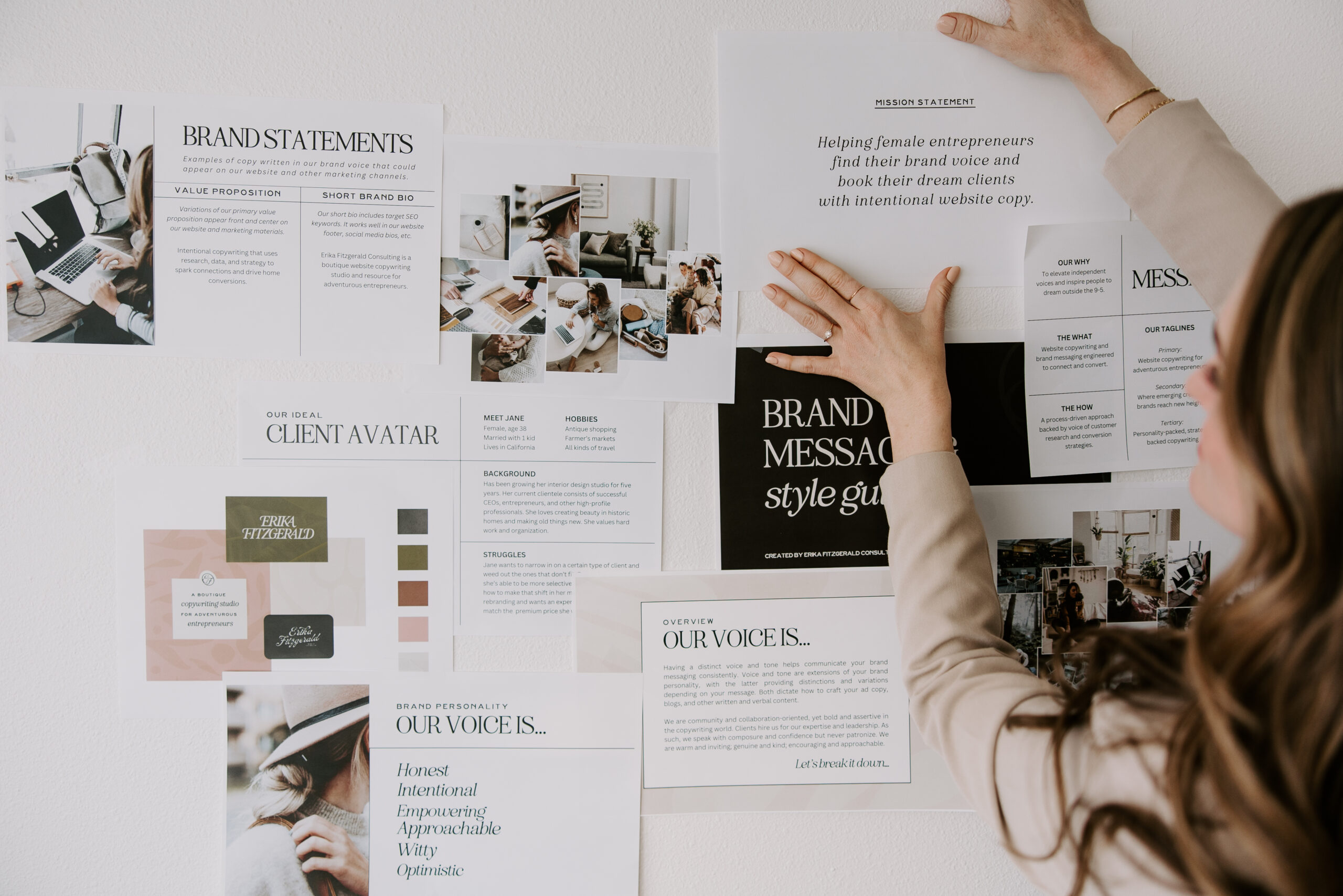 A website copywriter taping a mission statement to a wall